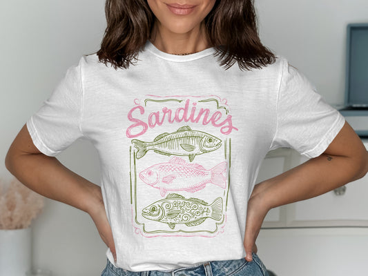 White t-shirt with "Sardines" text and two illustrated fish.