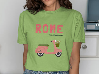 Green t-shirt with "ROME TOUS LES CHEMINS" and pink scooter illustration.