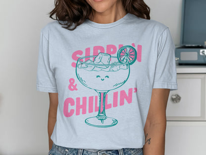 T-shirt graphic: margarita glass with ice, lime, and "sippin' & chillin'" text.