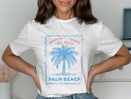 White t-shirt with pink framed "Preppy State of Mind Palm Beach" and palm tree graphic.