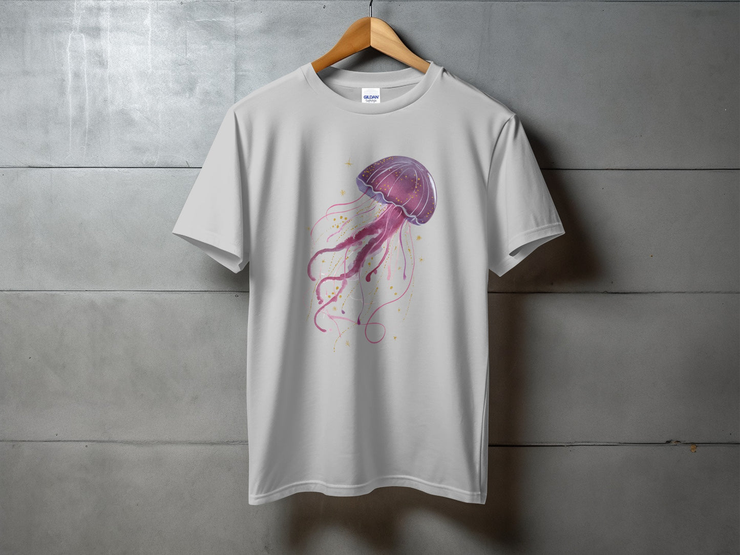 White t-shirt with a purple watercolor jellyfish graphic.
