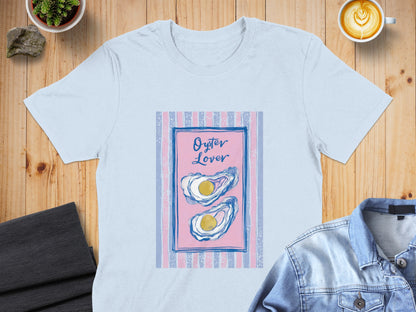 Light blue t-shirt featuring "Oyster Lover" text and two oysters on pink and blue stripes.