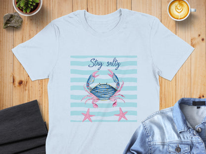 Light blue t-shirt with crab and starfish graphic and "Stay salty" text.