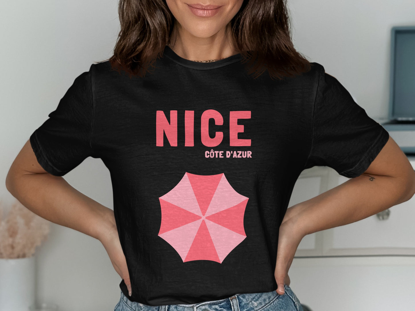 Black t-shirt with pink "NICE CÔTE D'AZUR" text and umbrella graphic.