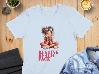 Light blue t-shirt with "RESTING BEACH FACE" graphic of a relaxed girl.