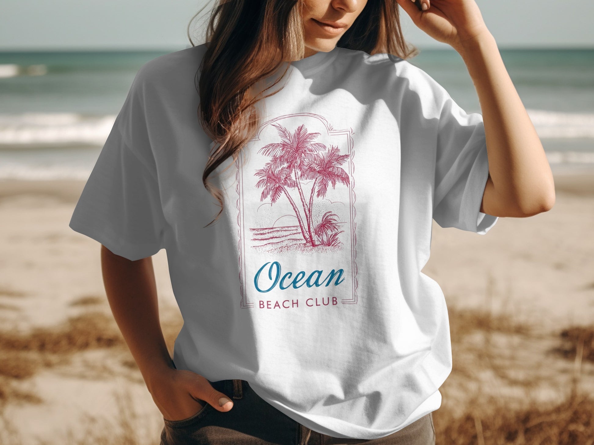 White t-shirt with palm trees and "Ocean Beach Club" text.