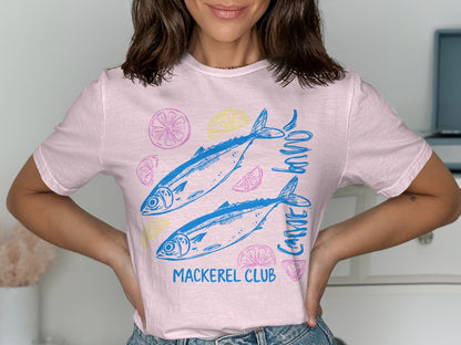 Pink t-shirt with two blue mackerel and sliced lemons, text "MACKEREL CLUB".