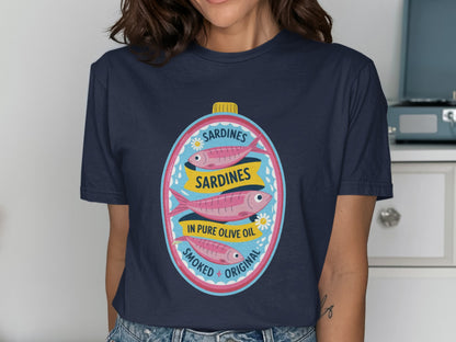 T-shirt with a vintage sardine can label design, "Sardines" text, and three fish.