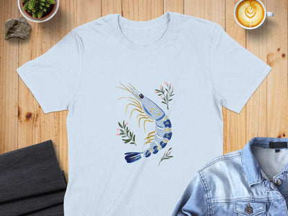 Light blue t-shirt with a blue and white shrimp and floral design.
