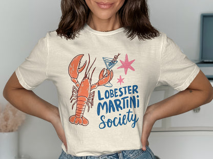 Lobster Martini Society graphic on cream t-shirt.