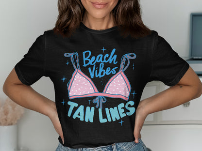 Black t-shirt with "Beach Vibes Tan Lines" text and pink polka dot bikini top graphic.
