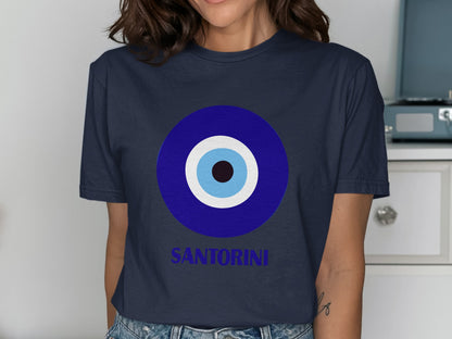 Navy t-shirt with blue, white, and black evil eye graphic and "Santorini" text.