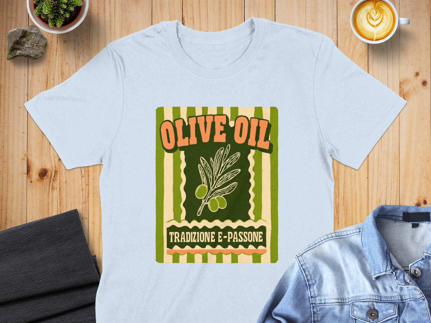 Light blue t-shirt with "Olive Oil Tradizione e Passione" graphic.