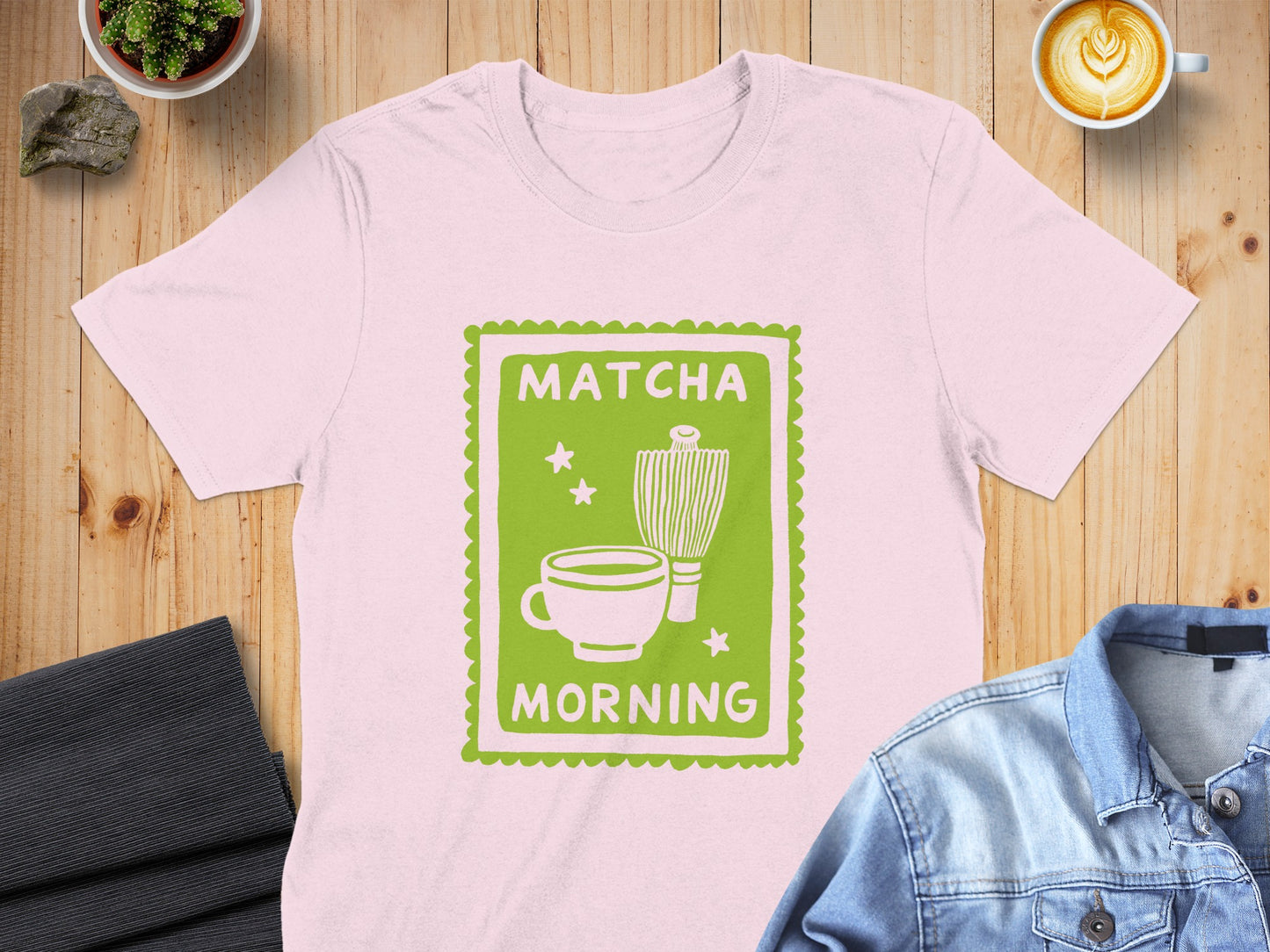 Pink t-shirt with green "Matcha Morning" graphic featuring a whisk and cup.
