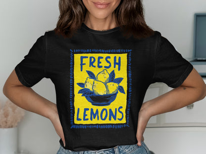 Black t-shirt with a square graphic of lemons in a bowl.