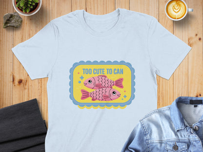 Light blue t-shirt featuring two pink fish with "Too Cute to Can" text.