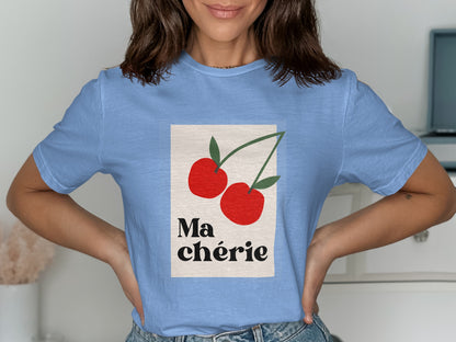 Light blue t-shirt with red cherries and "Ma chérie" text graphic.