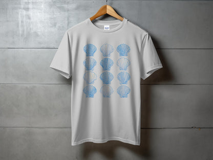 White t-shirt with a repeating pattern of blue seashell outlines.