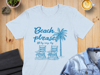 Light blue t-shirt with "Beach please all day every day" and palm trees.