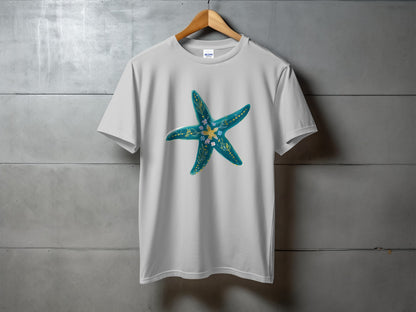 White t-shirt featuring a blue starfish with yellow and pink floral accents.