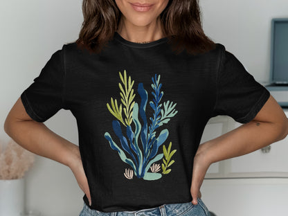 Black t-shirt with a blue and green abstract botanical print.