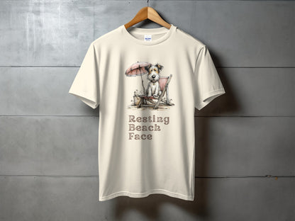 Cream t-shirt with "Resting Beach Face" and a dog on a beach chair.
