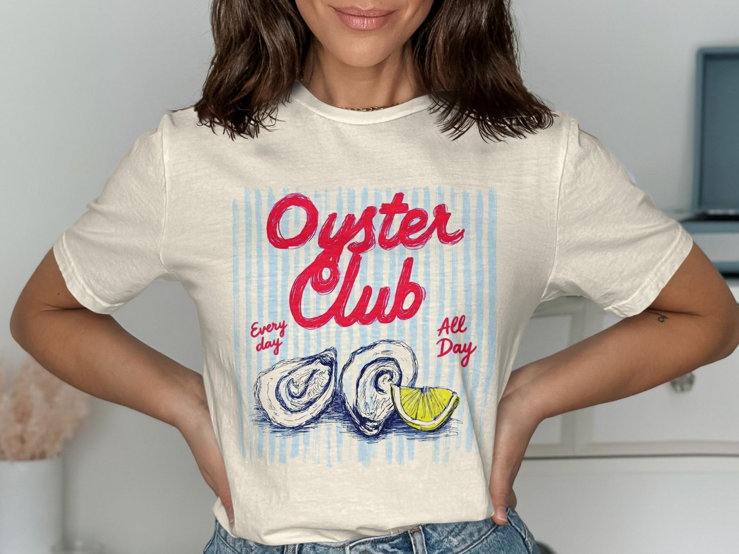 Cream t-shirt with red "Oyster Club" text and two oysters with lemon.