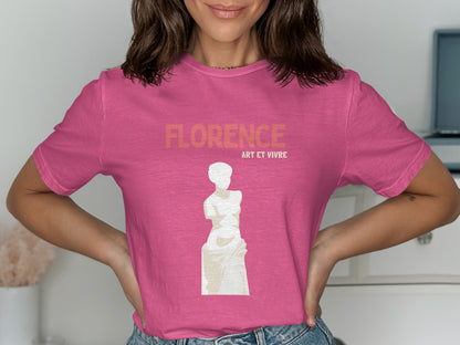 Pink t-shirt featuring a statue and "Florence Art et Vivre" text.