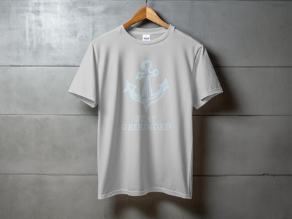 Light grey t-shirt with blue anchor and "STAY GROUNDED" text.