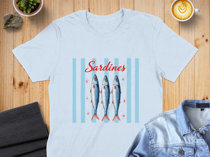 Light blue t-shirt with three sardines and red stars on blue stripes.