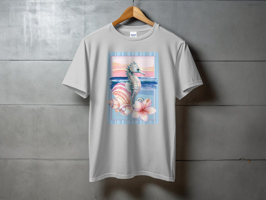 Seahorse, shell, and flower design on a light gray t-shirt.