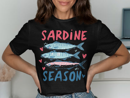 Black t-shirt with three stylized sardines and "SARDINE SEASON" text.