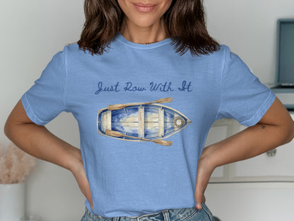 Blue t-shirt with "Just Row With It" and a watercolor rowboat graphic.