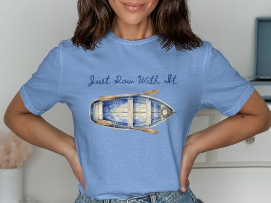 Blue t-shirt with "Just Row With It" and a watercolor rowboat graphic.