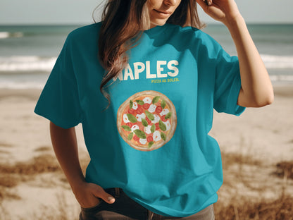 Teal t-shirt with Margherita pizza graphic and "NAPLES PIZZA AU SOLEIL" text.