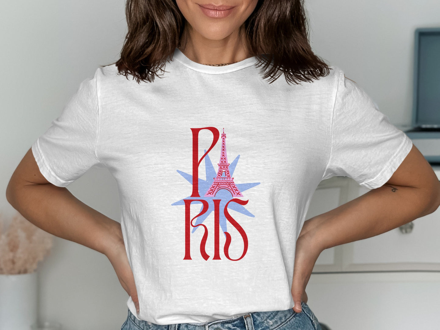 White t-shirt with "PARIS" text and Eiffel Tower graphic.