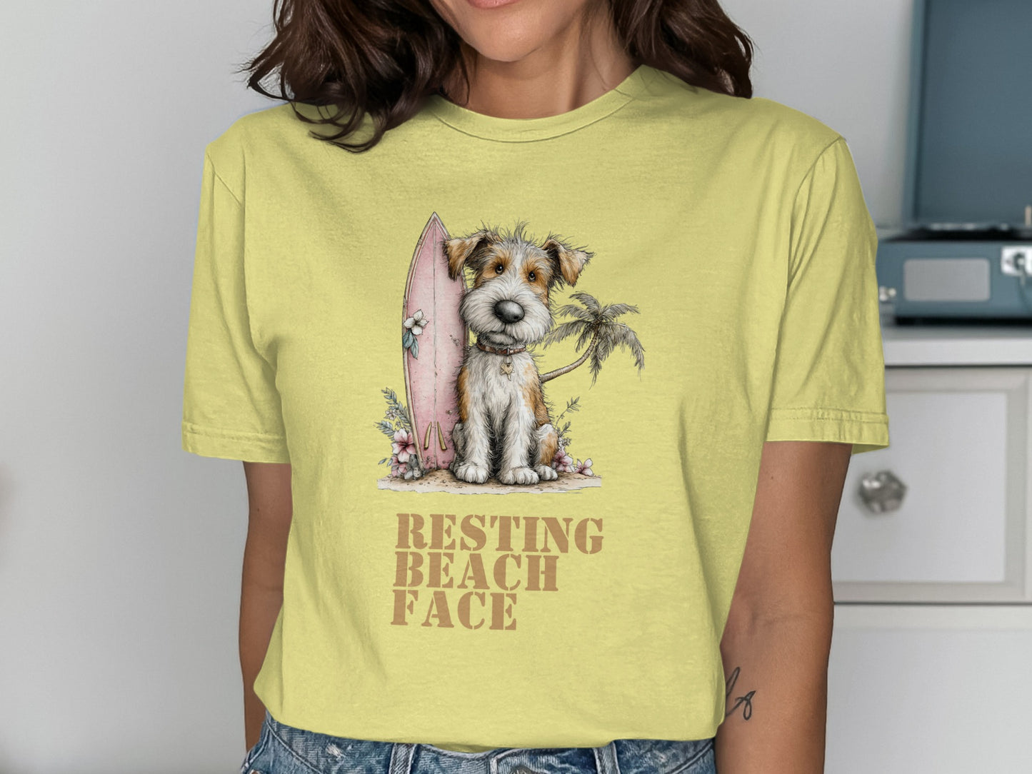 Dog with surfboard and palm tree graphic, "Resting Beach Face" text.