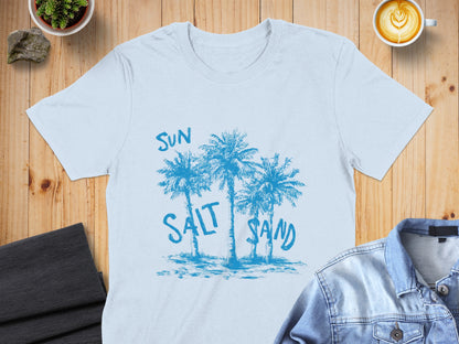 Light blue t-shirt with a graphic of three palm trees and the words "SUN SALT SAND".
