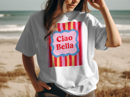 White t-shirt with "Ciao Bella" text on a striped pink and yellow background.