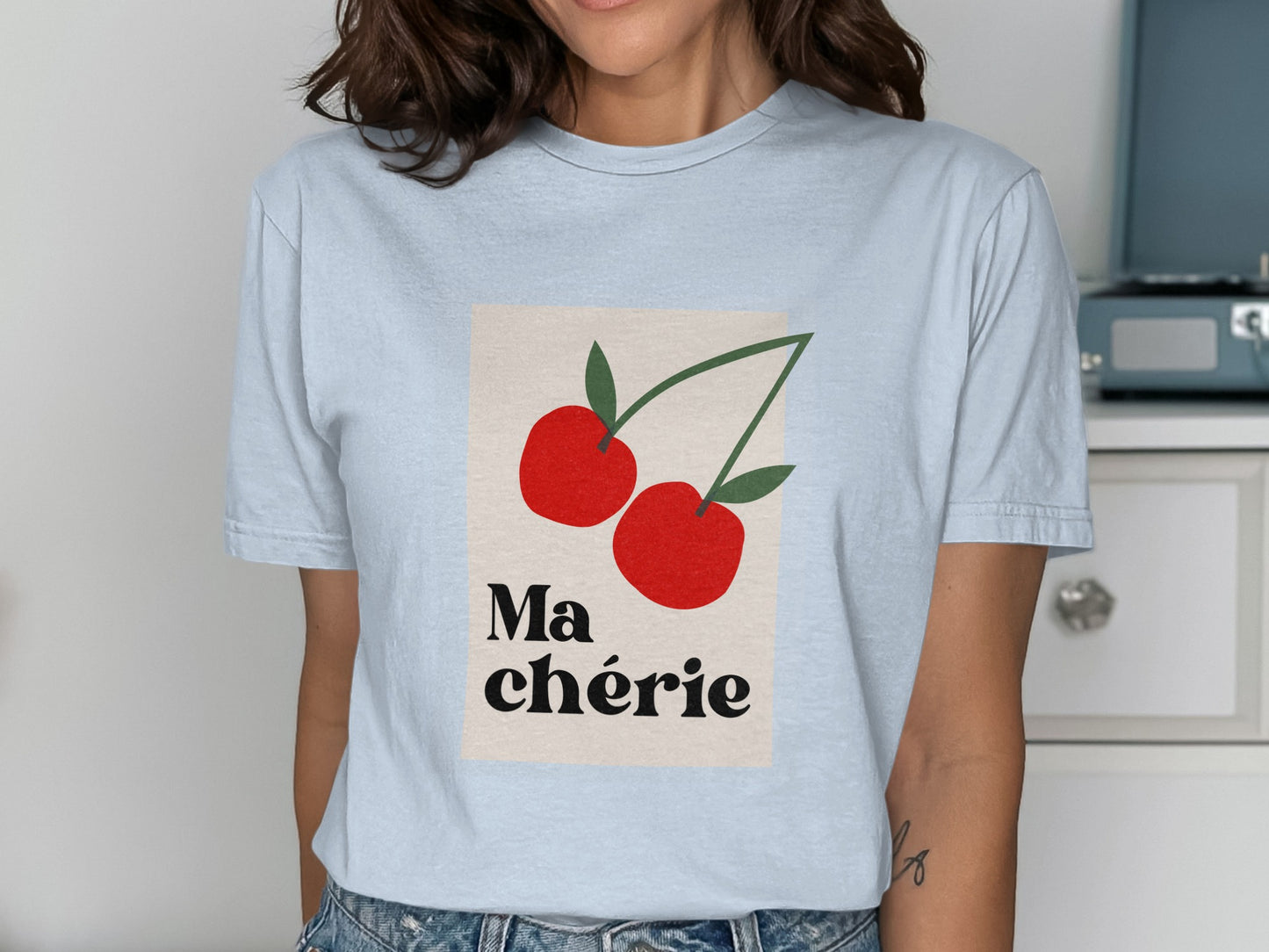 Light blue t-shirt with red cherries and "Ma chérie" text.