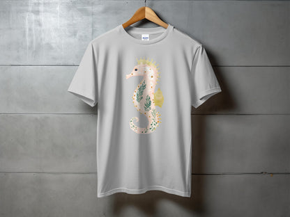 Gray t-shirt with a watercolor seahorse graphic featuring floral and leafy accents.