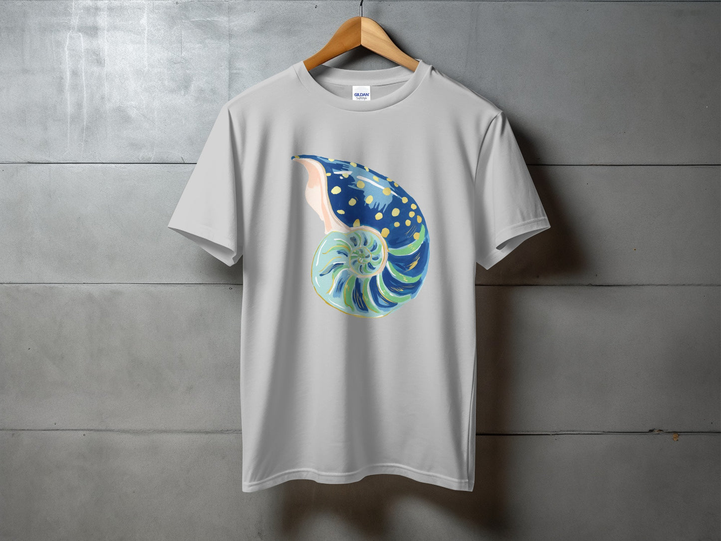 Grey t-shirt with a blue, green, and yellow nautilus shell design.