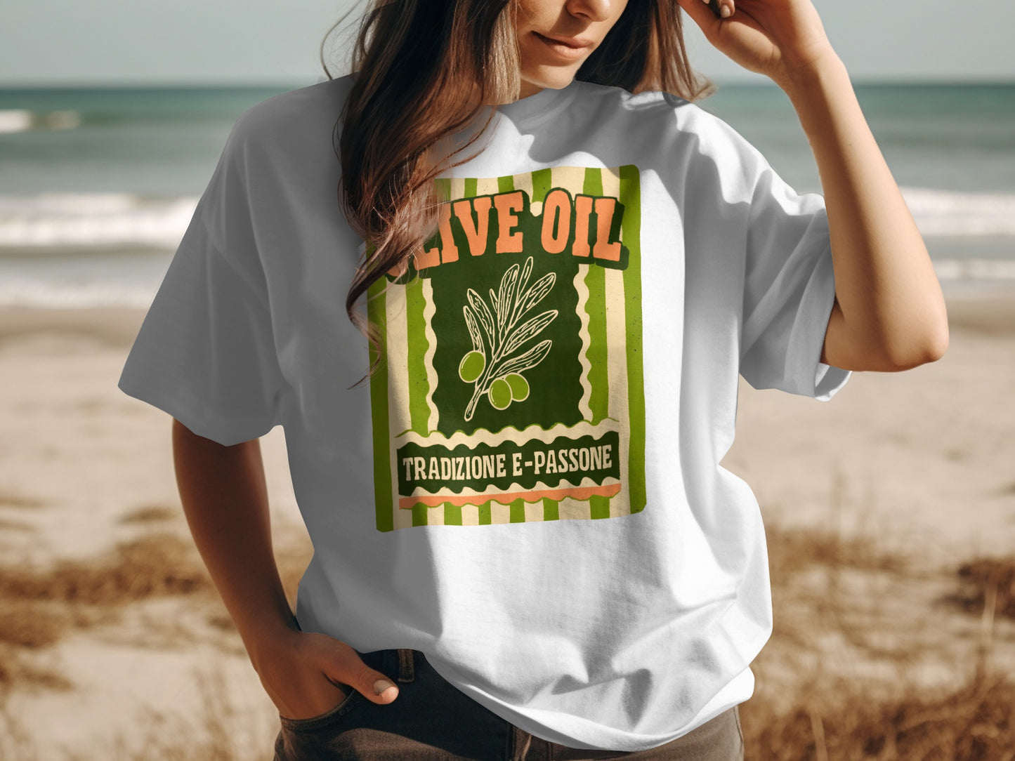White t-shirt with "OLIVE OIL TRADIZIONE E-PASSIONE" text and olive branch graphic.