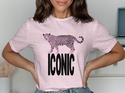 Pink t-shirt with a black and pink spotted leopard graphic and "ICONIC" text.