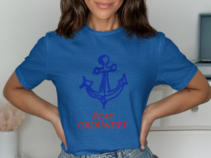 Blue t-shirt with red anchor graphic and "STAY GROUNDED" text.