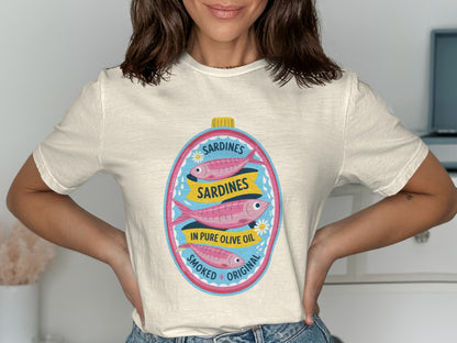 Cream t-shirt featuring a vintage sardine can label with text.