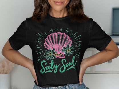 Black t-shirt with pink seashell, flowers, and "Salty Soul" text.
