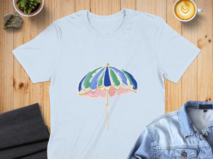 Light blue t-shirt featuring a colorful striped umbrella graphic.