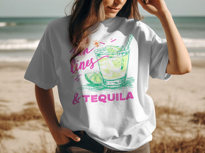 White t-shirt with a pink and green graphic of a margarita and text "sunshine & tequila".