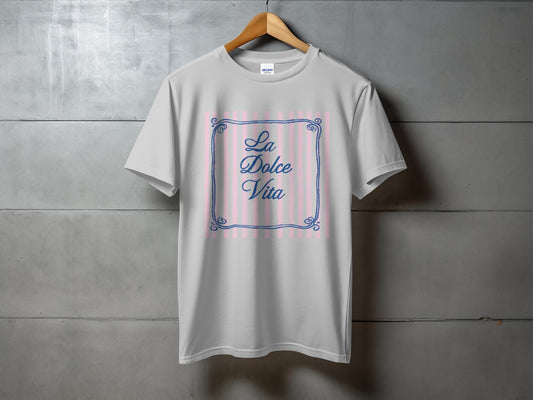 Grey t-shirt with "La Dolce Vita" text in pink cursive within a striped border.